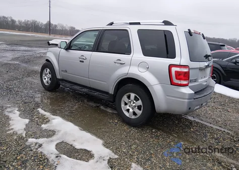 2009 Ford Escape Hybrid Limited из США, поврежденный, VIN 1FMCU59369KB26095